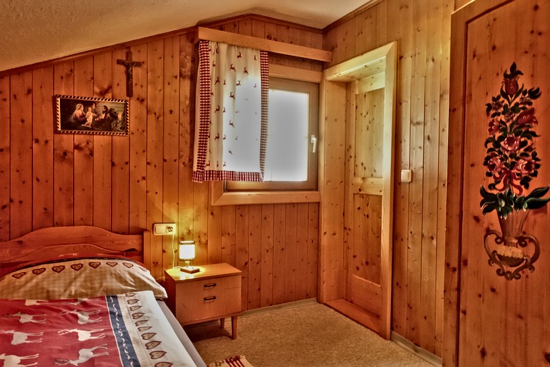 Original wood paneling creates a hut feeling and a healthy indoor climate